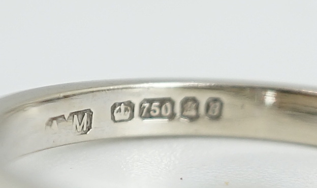 A 1970's 18ct white gold and solitaire diamond set ring